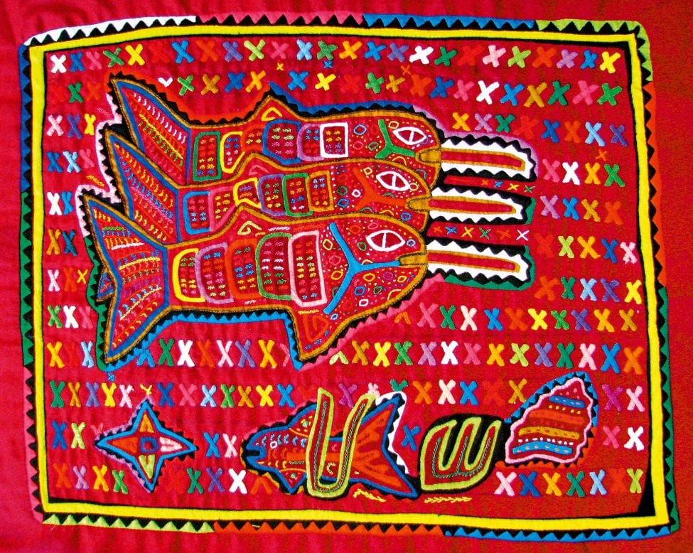 A colourful mola depicting three sawfishes. Molas are hand-made appliqué textiles produced mostly by the Guna women of the San Blas Archipelago, Panama, and often incorporate designs relating to their natural and mythological landscapes.<br />
Photo by Matthew McDavitt