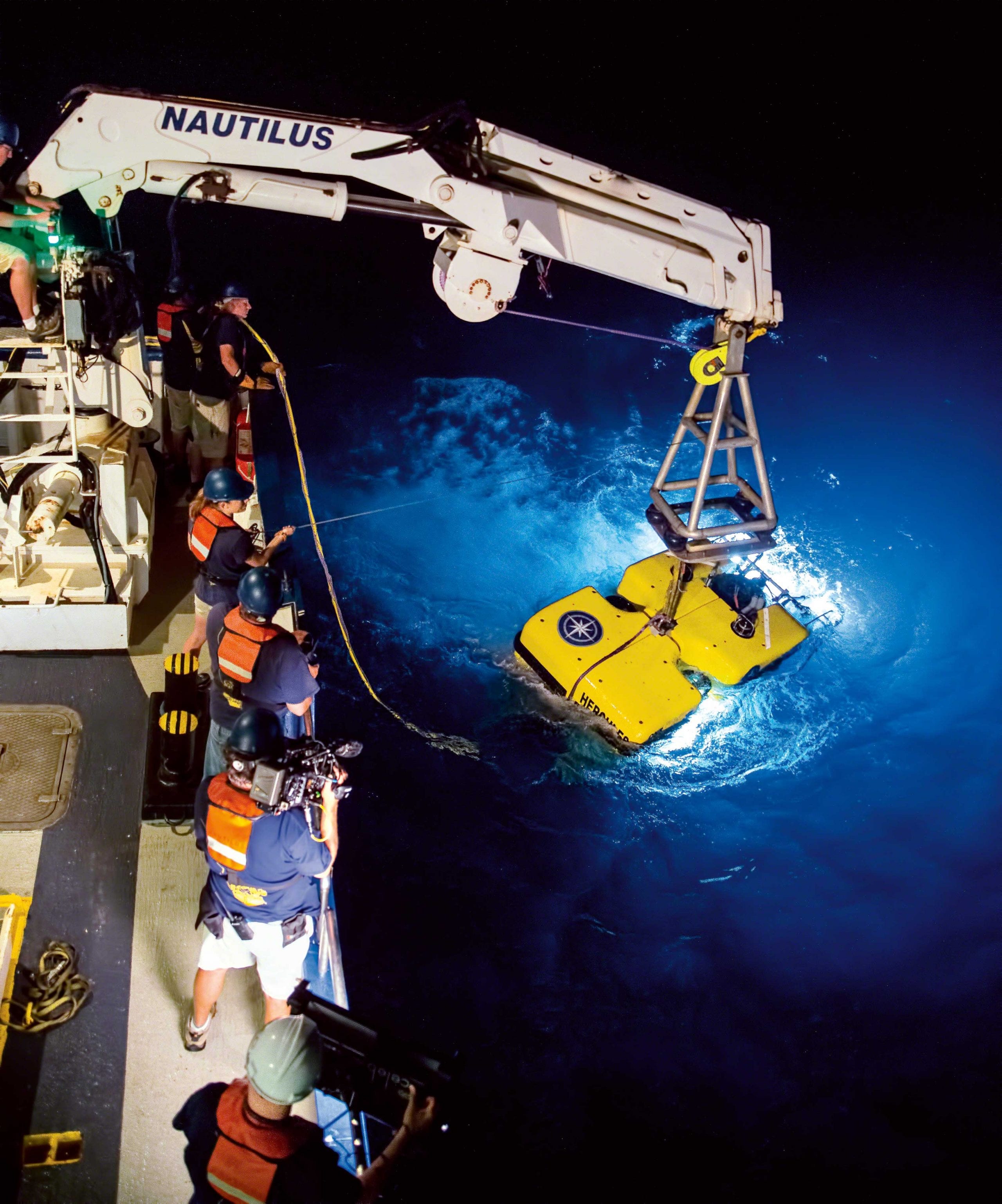 a research team aboard an underwater research vessel